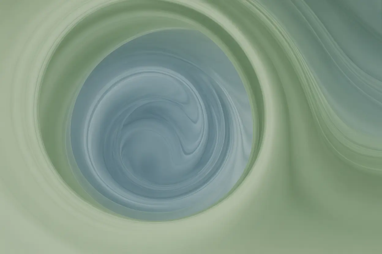 An abstract image representing calm and clarity with swirls of sage green and blue.
